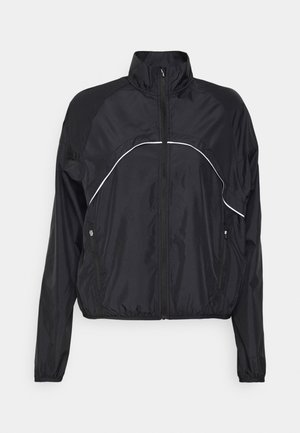 Zwarte lichtgewicht zip-up jack met hoge kraag, lange mouwen, elastische manchetten en zoom, twee voorzakken met rits en witte pipingen.