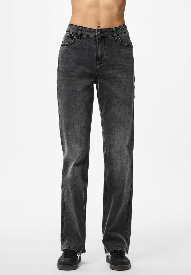 Black denim jeans with a straight-leg cut, featuring five pockets, a button waistband, and distressed detailing for texture.