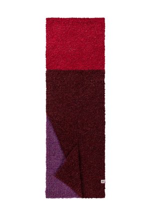 Rectangular textured rug with three color blocks: bright red top, dark burgundy middle, and purple bottom left corner folded.