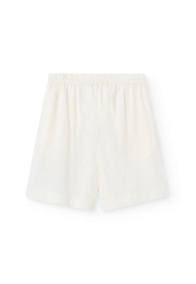 Krämfärgade bomullsshorts med elastisk midja, avslappnad passform, flat front och fållade kanter, utan synliga fickor eller dekorationer.
