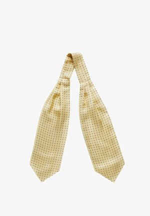 Vaaleanbeige silkki solmio, joka on pitkänomainen ja siinä on tasaisesti sijoitettu pieniä mustia pisteitä kankaan pinnalla. Silkkinen, pehmeä rakenne.