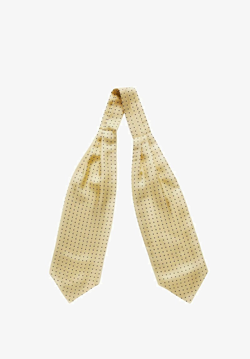 Vaaleanbeige silkki solmio, joka on pitkänomainen ja siinä on tasaisesti sijoitettu pieniä mustia pisteitä kankaan pinnalla. Silkkinen, pehmeä rakenne.