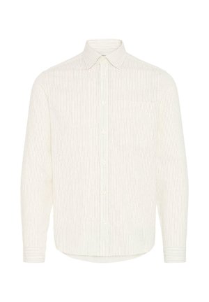 Ilgas rankovėmis, sagomis užsegama šviesios kreminės spalvos marškiniai su vertikaliomis juostelėmis. Turi smailų apykaklę, vieną krūtinės kišenę ir tekstūruotą audinį.