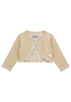Cardigan a maglia color crema con maniche lunghe, orlo scallop e accent di hardware a forma di cuore. Presenta un motivo testurizzato lungo i polsini.