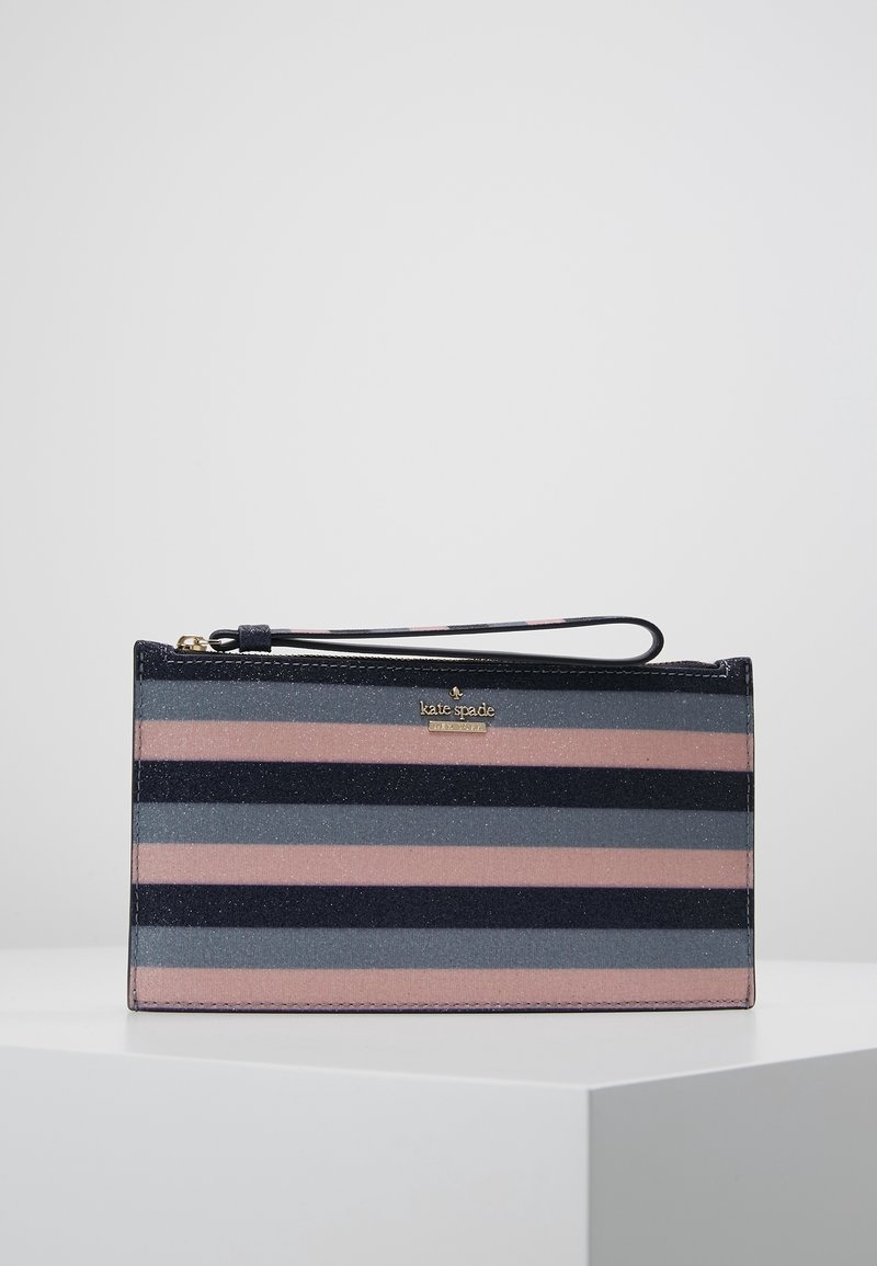 Striped clutch in navy, pink, and grey with a textured finish. Features a gold logo plaque and a wrist strap. Smooth zipper closure.