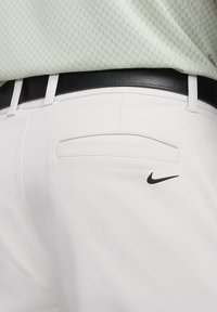 Nike Golf TOUR REPEL - Hlače - white