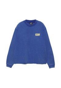 Blue crewneck sweatshirt with long sleeves and small yellow "STWD COMMUNITY" text on the left chest.