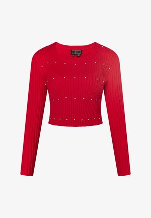 Red ribbed crop sweater with long sleeves, adorned with silver studs evenly distributed across the front. Features a round neck design.