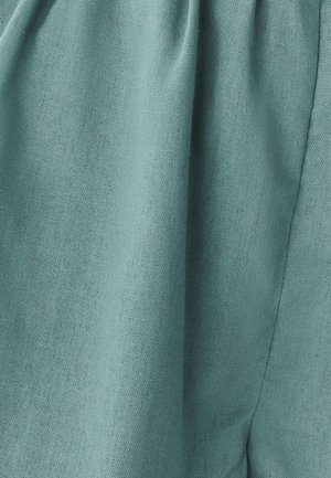 Teal fabric with a smooth texture, featuring a soft drape and subtle weave pattern, creating an elegant appearance.