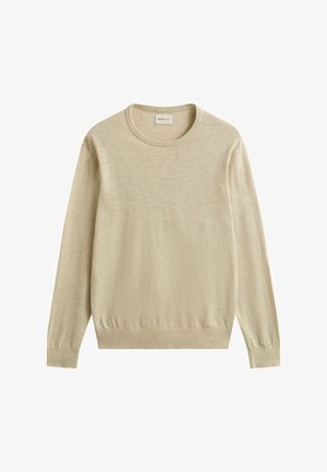 Pull beige à manches longues avec col rond, poignets et ourlet côtelés, en tissu tricot léger.