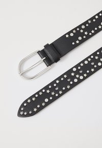 Black leather belt with silver star and circle studs, featuring a silver double-prong metal buckle and textured surface.