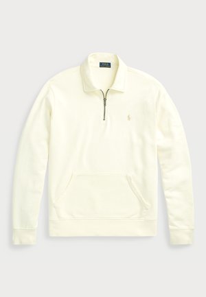 Polo sweatshirt i creme med lynlåskrave, ribbede manchetter og kængurulomme. Har broderet logo på brystet. Blød bomuldsblanding.