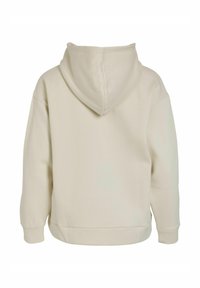 Sudadera con capucha en beige claro, hecha de una tela suave. Presenta un corte holgado, puños y dobladillo de canalé. La parte posterior no tiene elementos de diseño visibles.
