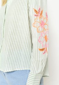 LolaLiza EMBROIDERED STRIPED - Button-down blouse - khaki mint