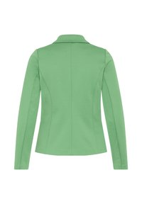 Groene damesblazer met lange mouwen, naaddetails en een klassieke kraag, gezien vanaf de achterkant op een witte achtergrond.