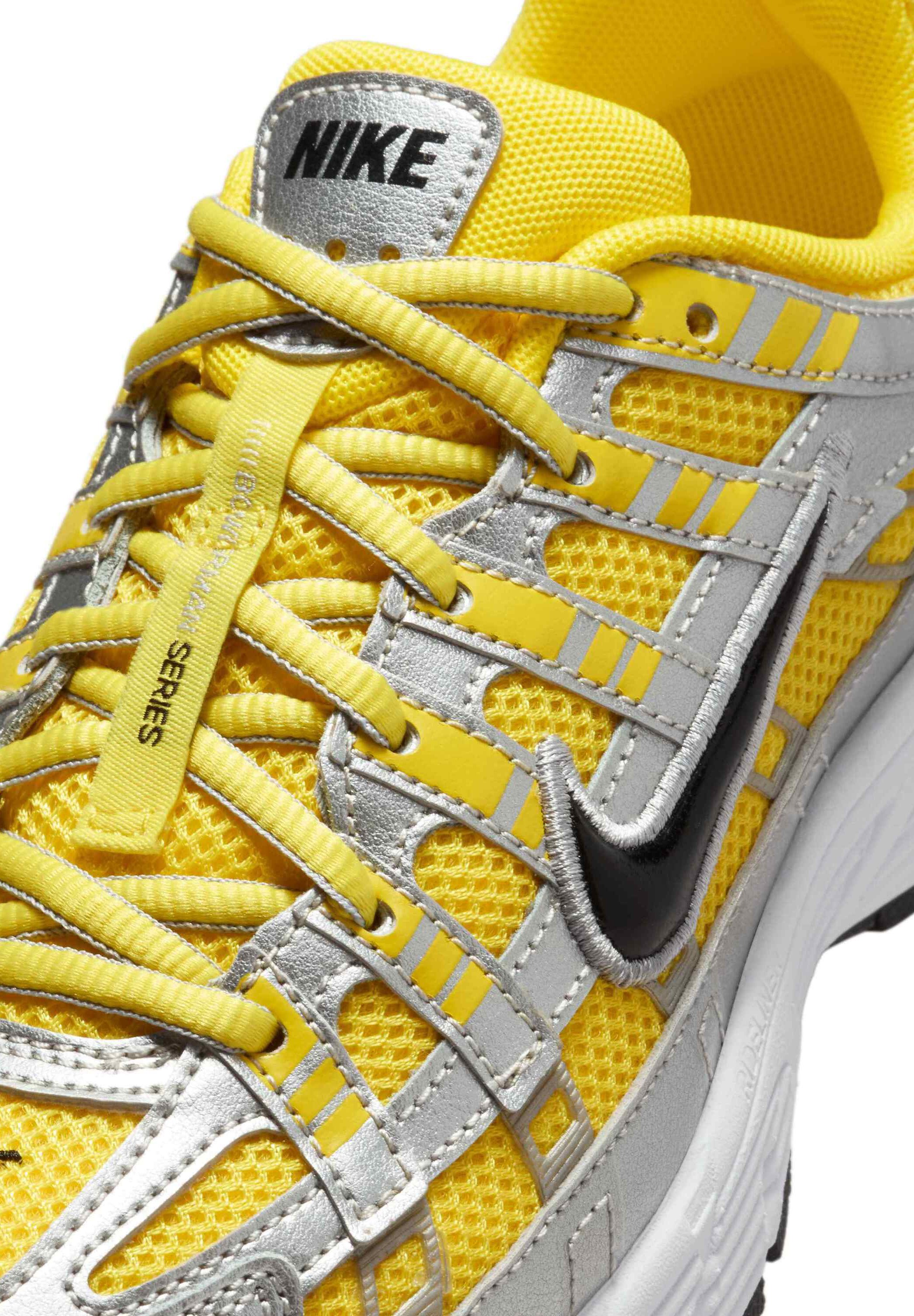 nike luminous yellow trainers