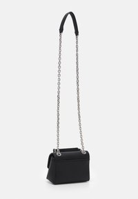 Calvin Klein RELOCK SHOULDER BAG - Borsa a mano - black