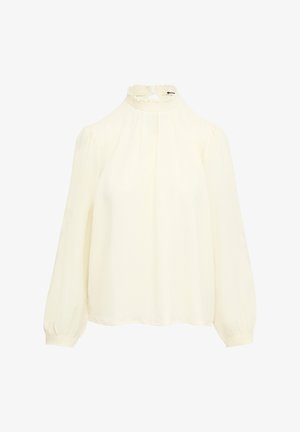 Crème-kleurige blouse met een hoge smockkraag, pofmouwen en elastische manchetten. De stof lijkt lichtgewicht en textuur te hebben.