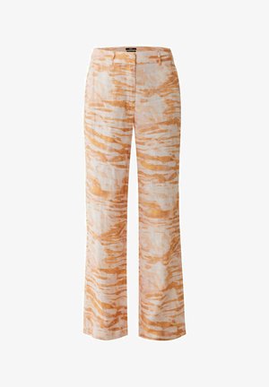 Pantalons en mélange de lin beige clair avec des rayures abstraites orange. Présente un design à jambes droites et quatre poches. Texture douce.