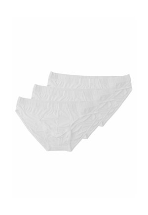 Tre slip bianchi in cotone impilati, con elastici in vita e tessuto liscio con leggere pieghe.