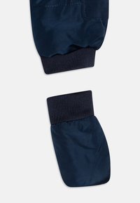 BOSS Kidswear Kombinezon zimowy