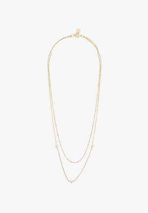 Guldtonad lagerhalsband med delikata kedjor, med hjärtaccent och spänne. Slät yta, lättviktig design.