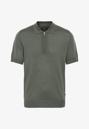Rövidujjú polo póló olajzöld kötött anyagból, cipzáras gallérral és rendezett bordázott mandzsettákkal és aljjal. Egységes struktúrájú felszínnel.