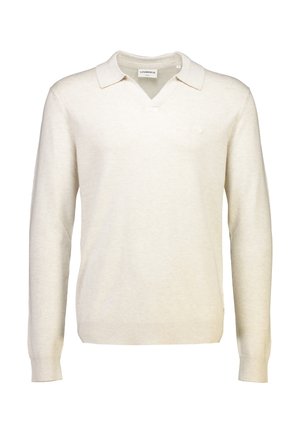 Krämfärgad tröja i mjukt tyg med v-ringning och långa ärmar, med en diskret logotyp på bröstet.