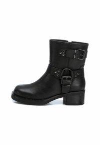 XTI Botines camperos - black