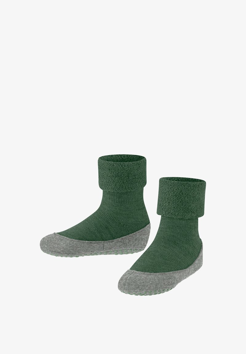 Calze verdi in maglia con risvolto e suole grigie testurizzate. Le suole presentano piccoli punti per la presa. Il materiale sembra morbido ed elasticizzato.