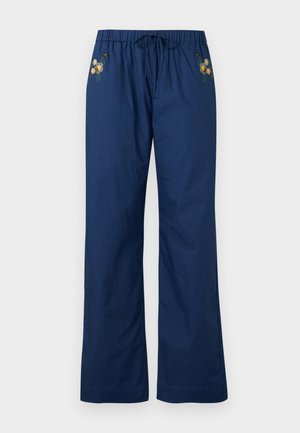 Pantaloni blu navy a gamba larga con vita elasticizzata e coulisse, caratterizzati da piccoli ricami floreali gialli e bianchi vicino alle tasche.