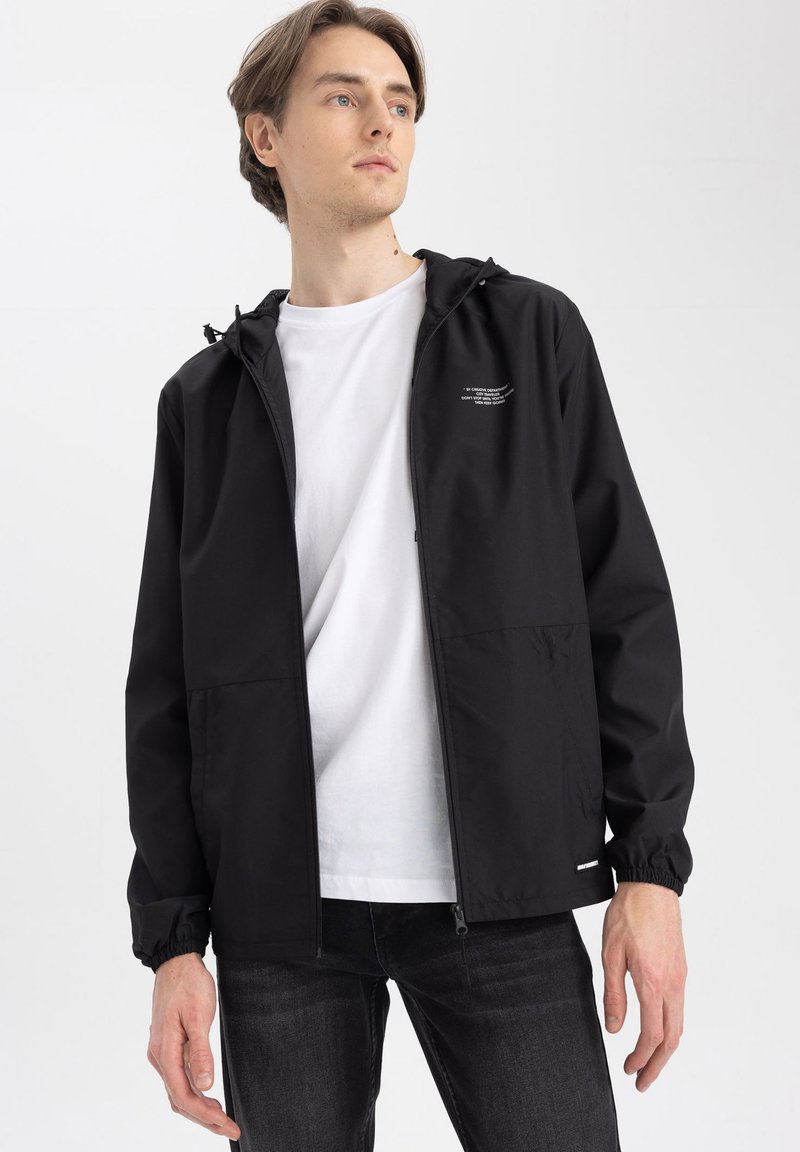 Giacche Per Bambini Giacca Snowboard Bambino SNB 100 Nera