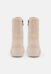 Marco Tozzi Lace-up ankle boots - cream
