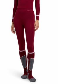 Bordowe legginsy termiczne o prążkowanej fakturze, z kontrastową szarą częścią na kolanach, elastycznym pasem i paskami przy kostkach.