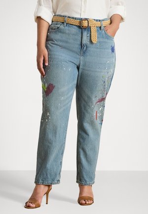 Light blue denim jeans feature a loose fit and paint splatter accents in colors like purple, green, and red. A braided tan belt completes the look.