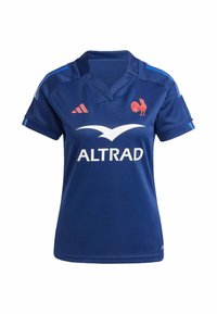 Camiseta de rugby azul hecha de un tejido transpirable, con cuello en V, mangas cortas, acentos rojos, un logo de gallo y la marca ALTRAD.