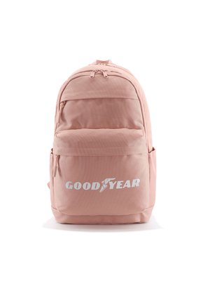 Pink fabric backpack with dual zippers, front pocket, and side mesh pocket. Features white "GOOD YEAR" logo on the front. Standard shape and design.