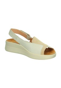 Beige und cremefarbene Keilsandalette mit offenen Zehen, geschlitztem Obermaterial und verstellbarem Slingback-Riemen. Weicher Wildlederlook.