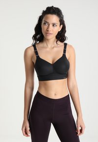 triaction by Triumph - HYBRID LITE NON-WIRED PADDED - High support sports bra - black Thumbnail Image 1