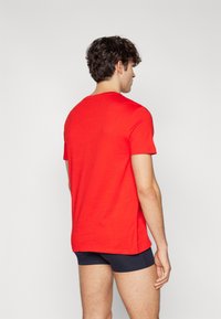 Tommy Hilfiger LOGO - Pyjamashirt - fierce red