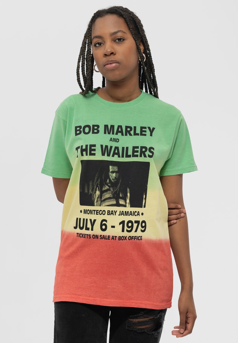 Green to yellow to red gradient t-shirt featuring black text and an image of Bob Marley. Round neck and short sleeves.
