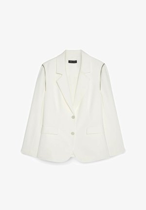 Hvid skræddersyet blazer med hakkede revers, to forreste knapper, klaplommer og diskrete lynlåsdetailler ved skuldersømmene.