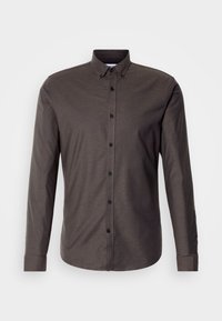 Chemise homme à manches longues gris foncé avec boutons et col boutonné sur fond clair uni.