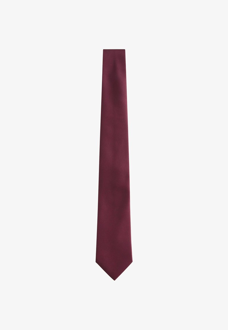 Cravatta bordeaux con un tessuto strutturato, forma stretta e punta a contrasted. Colore uniforme con un motivo sottile, adatta per occasioni formali.