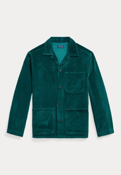 Teal corduroy jacket with a pointed collar, front pocket, two side pockets, and button closure. Features vertical ribbed texture.