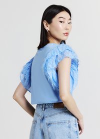 Calliope T-shirt con stampa - celeste