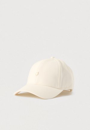 Gorra hecha de tela color crema con corona redondeada y visera curva. Presenta un pequeño logo en la parte frontal. Textura suave.