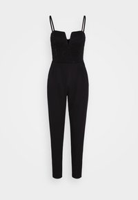 Mono negro sin mangas con cuerpo de encaje, escote en V, tirantes dobles y pantalones ajustados.