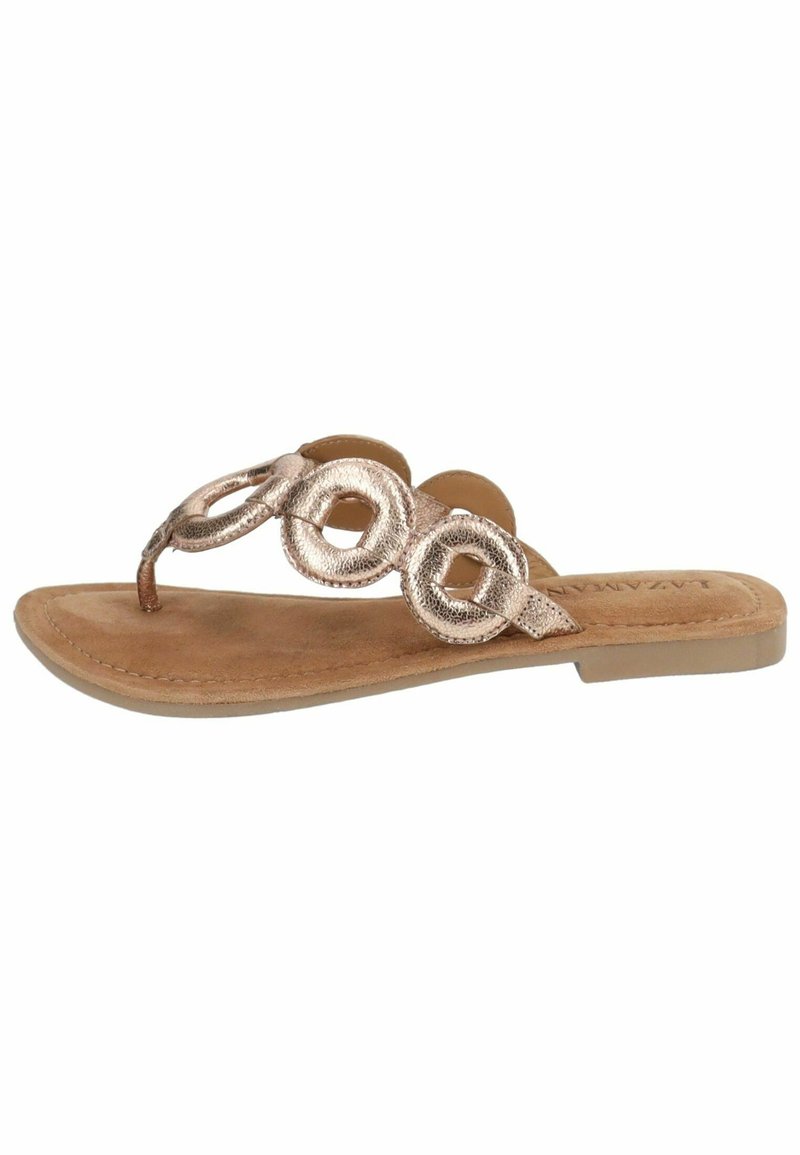Sandali infradito piatti in oro rosa metallico con accenti in metallo circolari, soletta in materiale scamosciato e design minimalista.