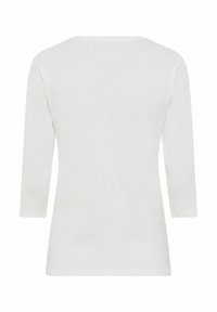 Witte langsloubige T-shirt met een ronde halslijn, gemaakt van zachte katoen, met een eenvoudig ontwerp en een gladde textuur zonder versieringen.